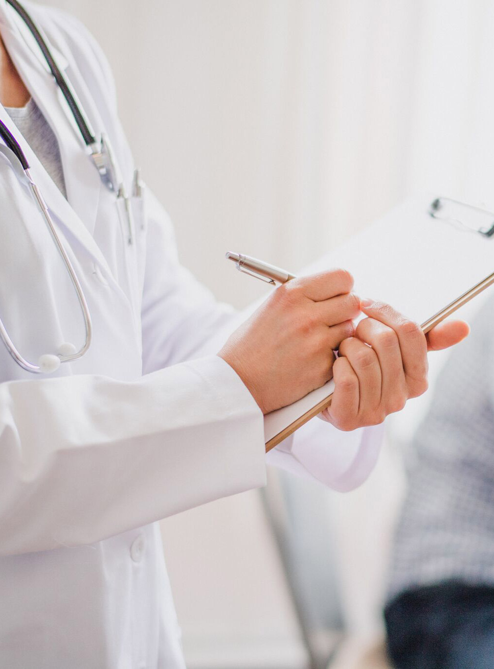 Doctor holding a clipboard